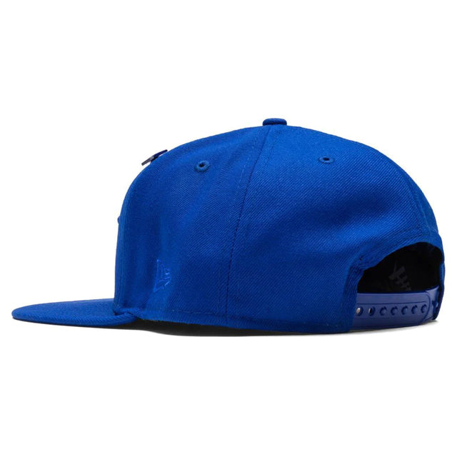 GORRA NEW ERA X PAPER PLANES BLACKOUT CROWN 9FIFTY BLUE